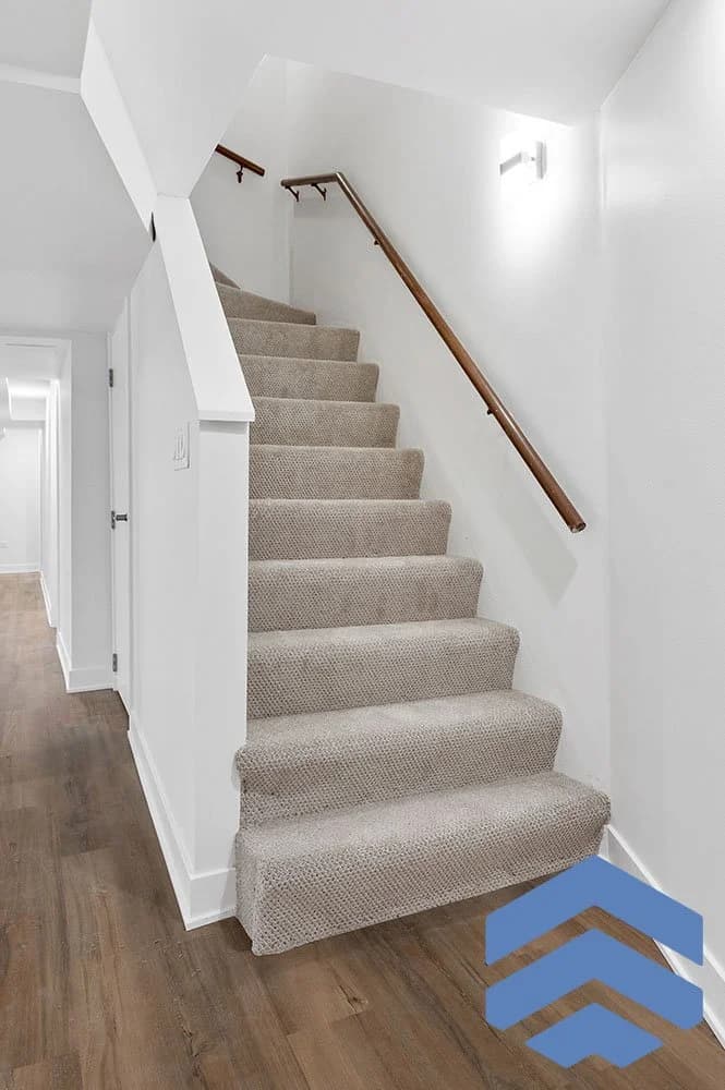 Basement stairs renovated with new carpet