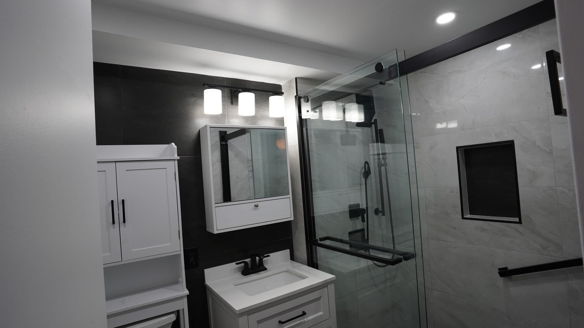 Clinton Hill bathroom renovation with glass shower and matte black fixtures