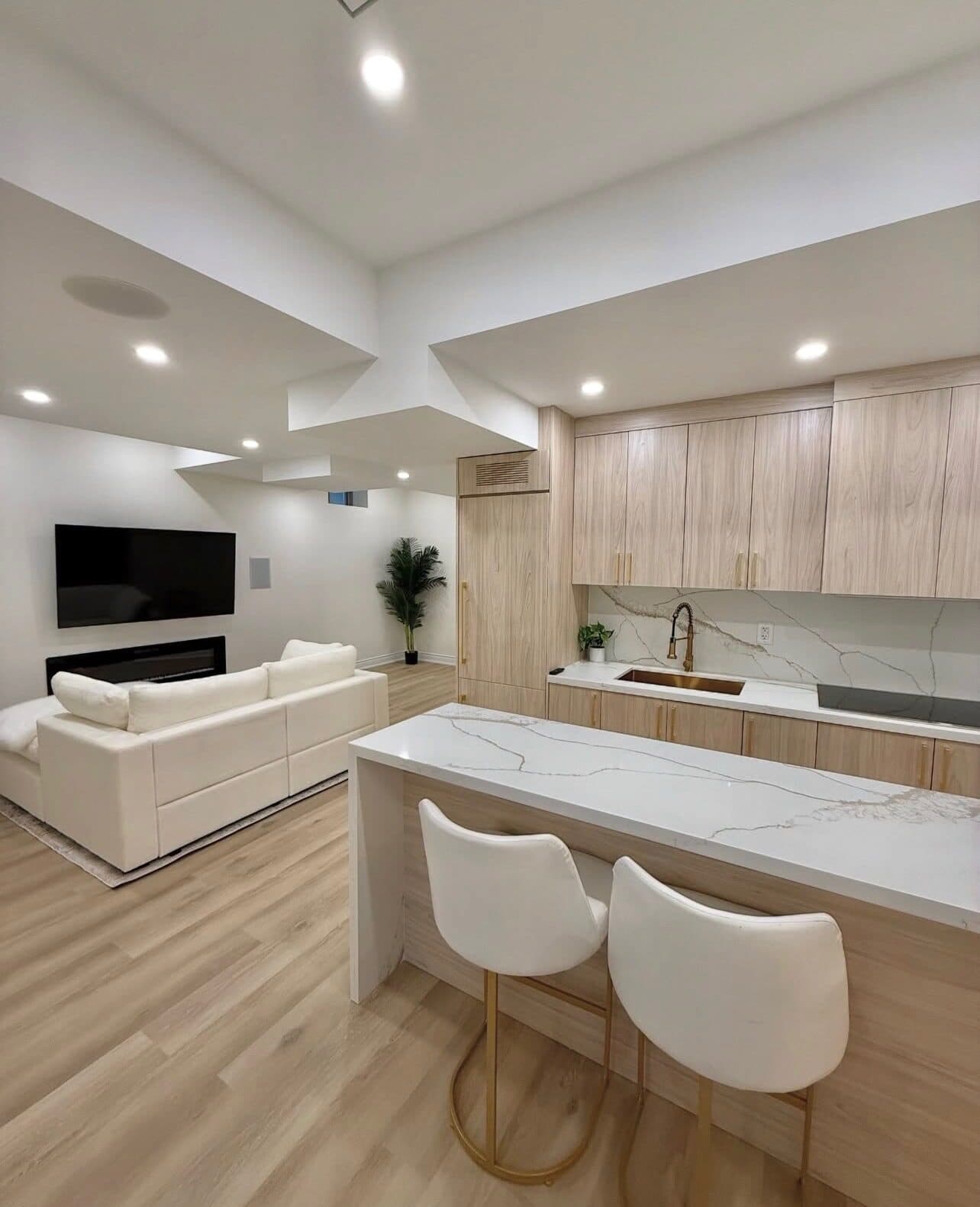 Kitchenette and den of Alpha's FiDi apartment renovation