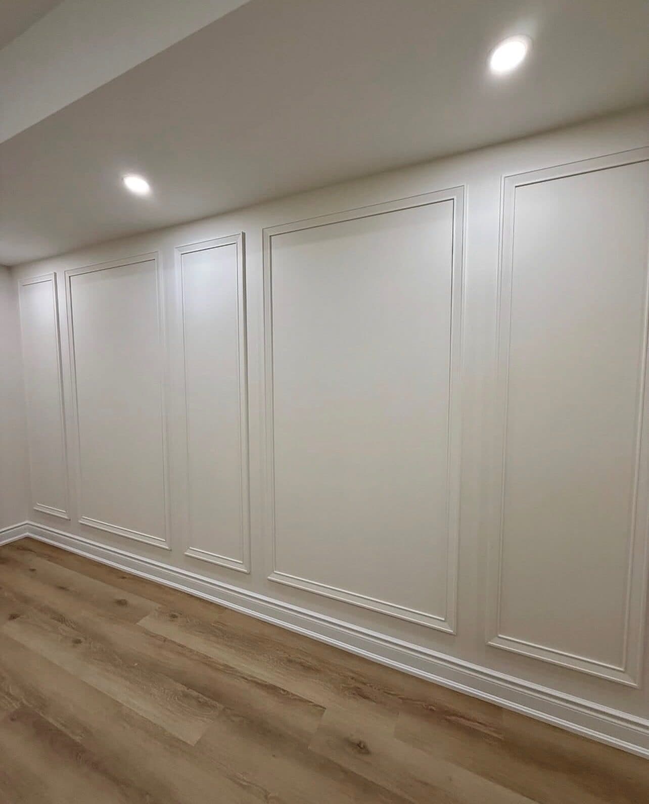 Wall paneling detail along the renovated corridor